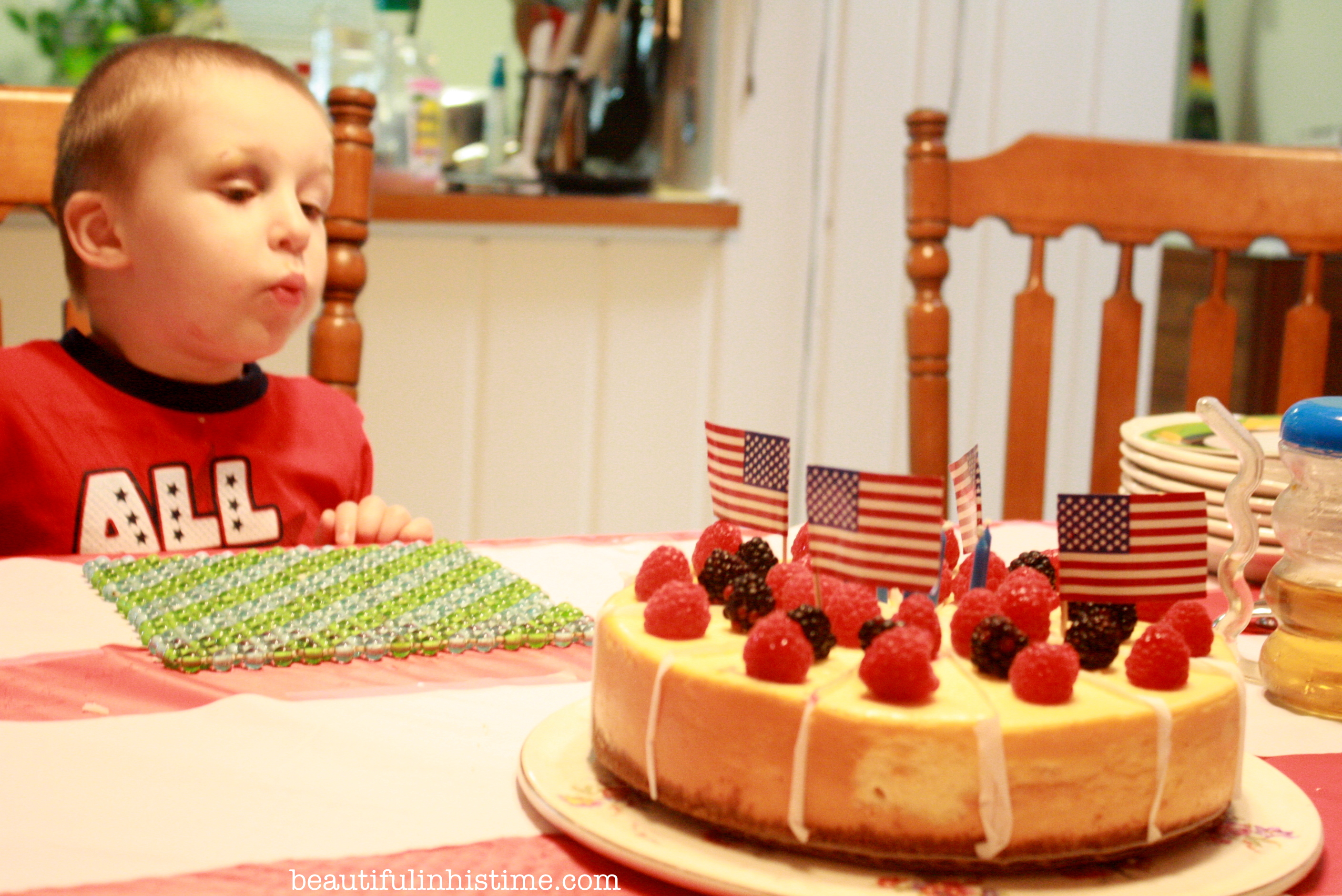 blowing out candles: A Birthday Party for America! #birthday #america #4thofjuly #independenceday #party #birthdayparty #candles #birthdaycake